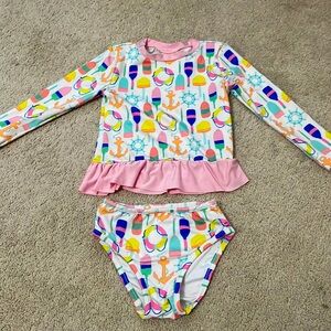 Smockingbird 2 piece swim suit. Rash guard top. 3T, like brand new.